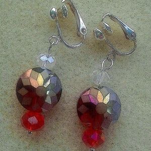 “Etched Red Snowflake or Sunburst” clear crystal clip on earrings PRICE IS FIRM
